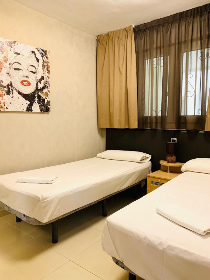 Apartamentos Boutique El Cano 奥罗佩萨德尔马 外观 照片
